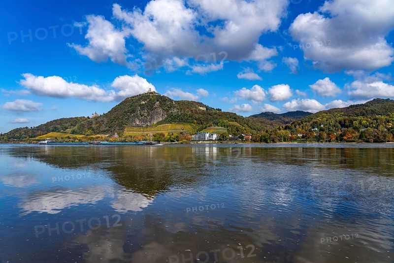 Drachenfels, a mountain in the Siebengebirge on the Rhine between Bad Honnef and Königswinter, with Drachenfels castle ruins and Drachenburg castle, left, boat traffic on the Rhine, North Rhine-Westphalia, Germany, Europe
