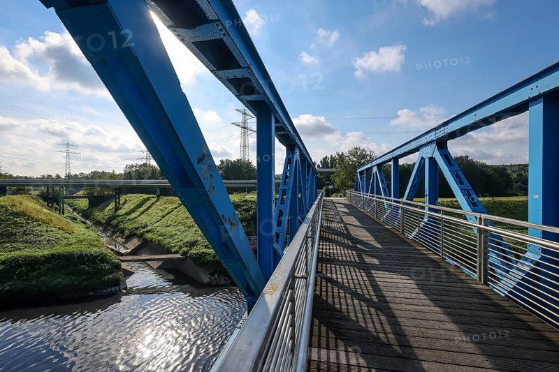 Essen, North Rhine-Westphalia, Germany - The Emscher has been completely free of wastewater since January 2022 following the construction of a parallel sewer. The river, shown here at the mouth of the Schwarzbach, was previously an open, above-ground wastewater sewer, mixed sewer with surface water and wastewater