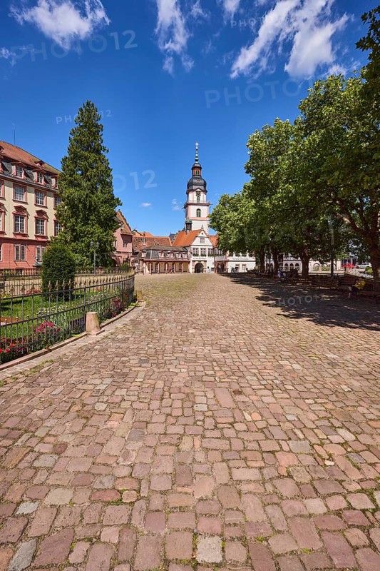 Church tower, Erbach town church, trees, cobblestone square, blue sky with cumulus clouds, market square, Erbach, Odenwald, Odenwaldkreis, Hesse, Germany, Europe