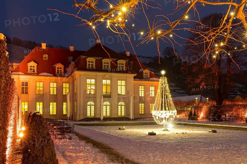 Wackerbarth's winter magic, castle and vineyards with Christmas lights and snow, Radebeul, Saxony, Germany, Europe