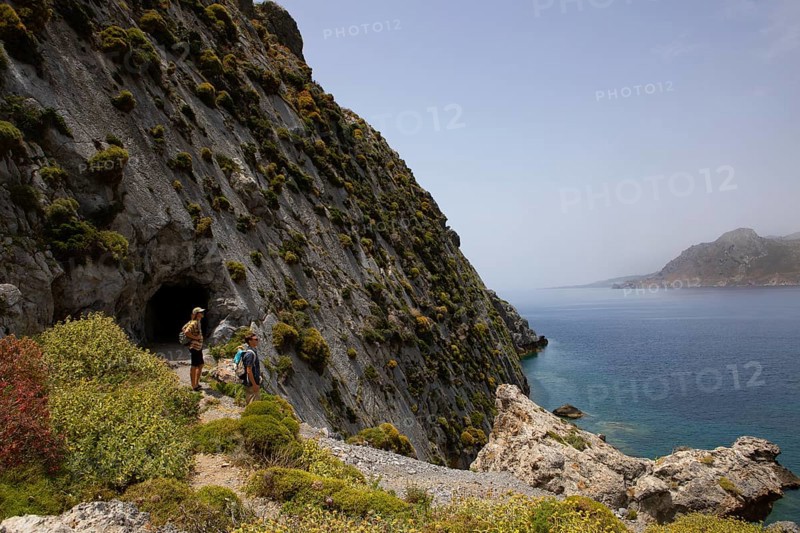 Hikers on the Sarella peninsula near Plakias, south coast, Crete, Greece, Europe