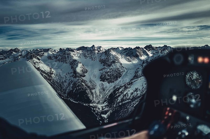 Flight over the late winter Lech Valley with a small aeroplane in Tyrol, Austria, Europe