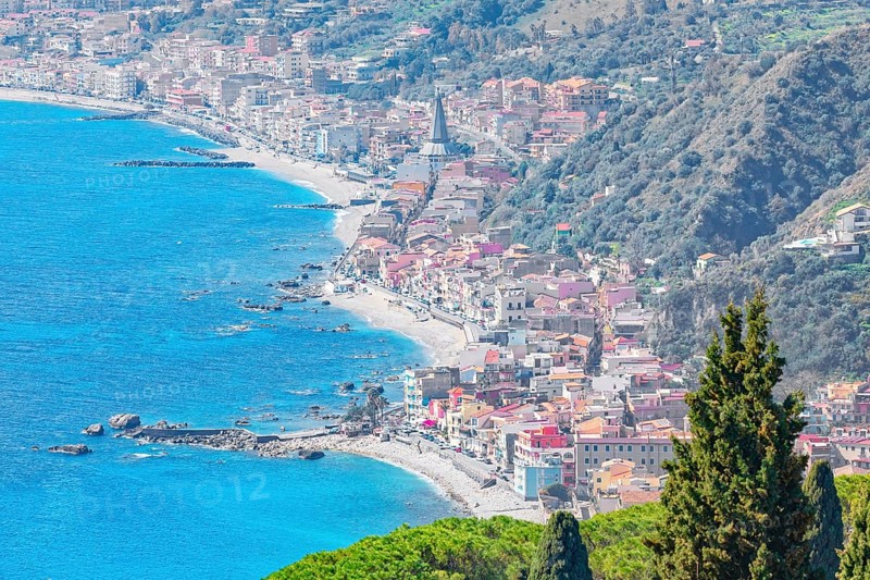 View of the Ionian coast and Giardini di Naxos in the distance, Taormina, Sicily, Italy, Europe