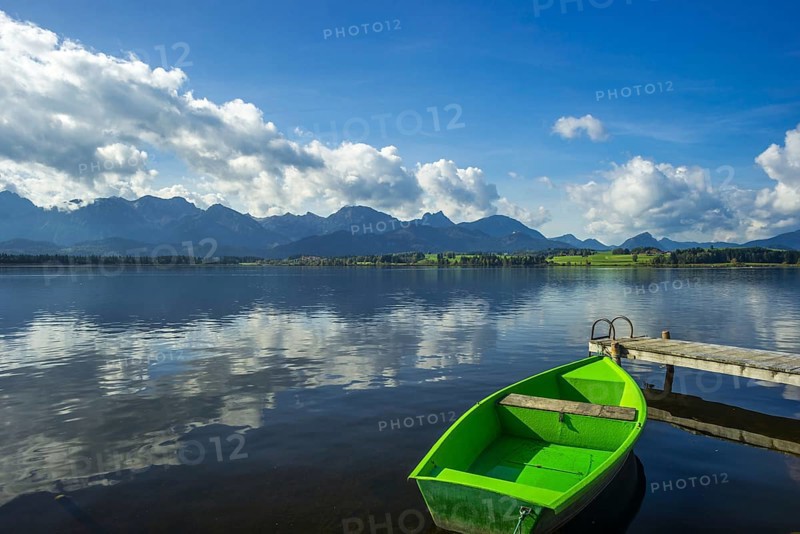 Green rowing boat, Hopfensee, Hopfen am See, near Füssen, Ostallgäu, Allgäu, Bavaria, Germany, Europe