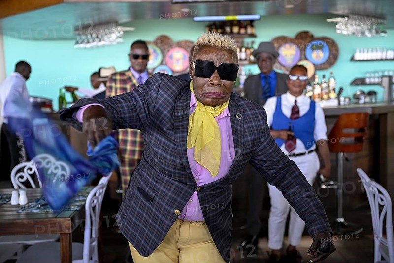 Sapeuse, member of the Société des Ambianceurs et des Personnes élégantes (SAPE), society of entertainers and stylish people, Brazzaville, Republic of Congo