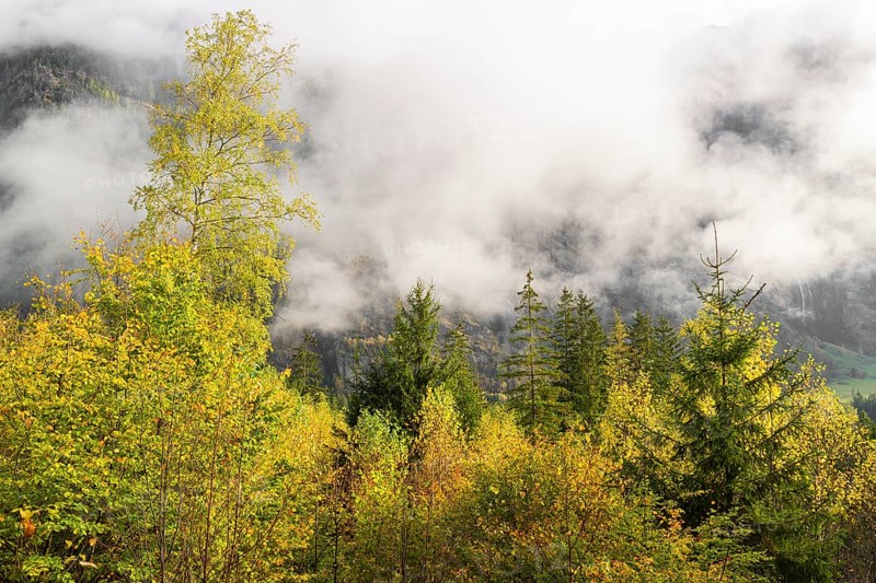 Autumn scene, landscape covered in the clouds, Malta valley, Carinthia, Austria, Europe