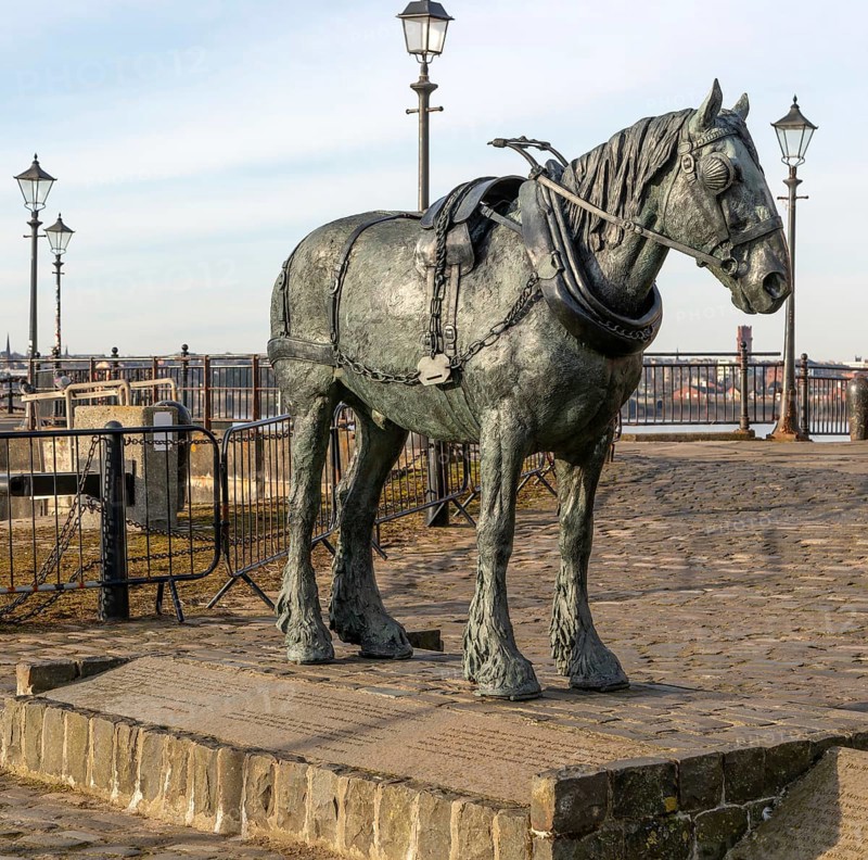 Sculpture 'Waiting' by Judy Boyt celebrating the working horses of the docks, Pier Head, Liverpool, England, UK c 2010