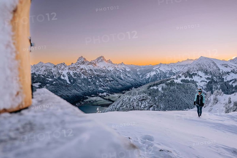 Summit bliss in the snow-covered winter landscape in the Tannheimer Tal in the Alps on the Neunerköpfle, Tyrol, Austria, Europe