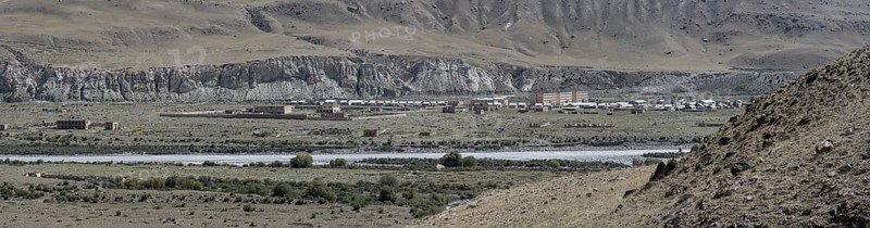 Town view, Engilchek river with village, ghost town, Engilchek, Tian Shan, Kyrgyzstan, Asia