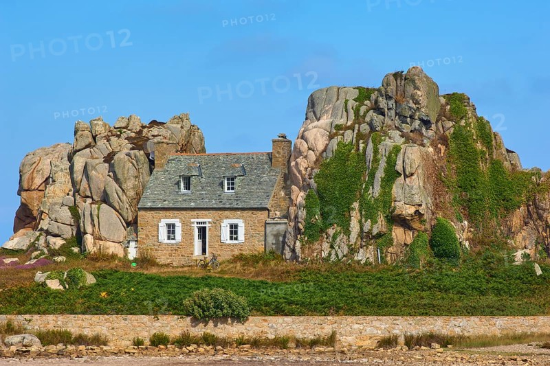 House between rocks, Le Gouffre de Plougrescant, Cote de Granit Rose, Cotes d'Armor, Brittany, France, Europe