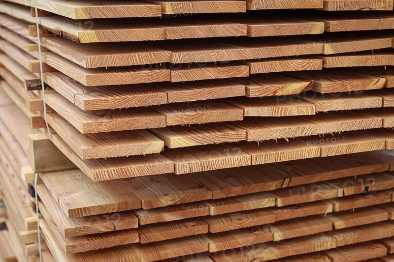 Solingen, North Rhine-Westphalia, Germany - Larch logs are processed into construction timber, construction timber is scarce and expensive, carpentry and joinery companies are struggling with rapidly rising raw timber prices in times of the corona crisis, and large quantities of logs are exported to China and the USA