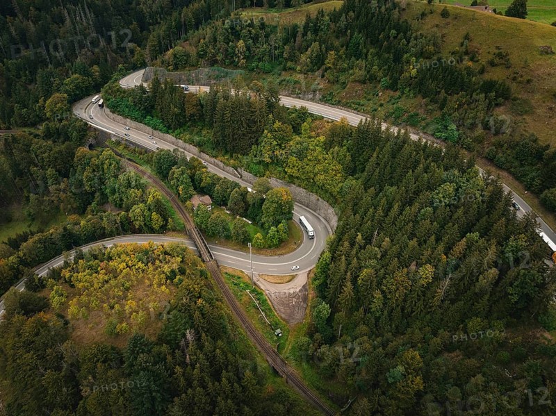 Winding road through green forest from a bird's eye view, Ravenna Gorge, Black Forest, Germany, Europe