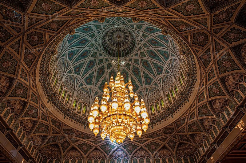 Dome and illuminated chandelier in the Sultan Qaboos Mosque, Muscat, Arabian Peninsula, Sultanate of Oman