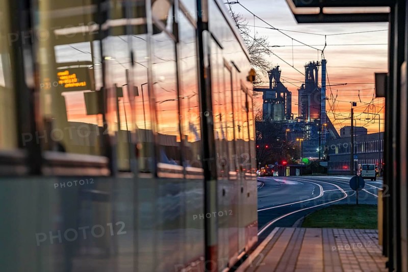 Duisburg-Bruckhausen steel site, ThyssenKrupp Steel, blast furnaces 8 and 9, on Kaiser-Wilhelm-Straße, sunset, tram, North Rhine-Westphalia, Germany, Europe