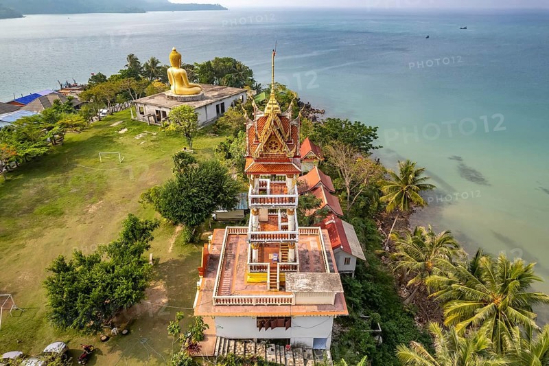 The big Buddha of Wat Ao Salat in the fishing village of Ban Ao Salad seen from the air, Ko Kut Island or Koh Kood Island in the Gulf of Thailand