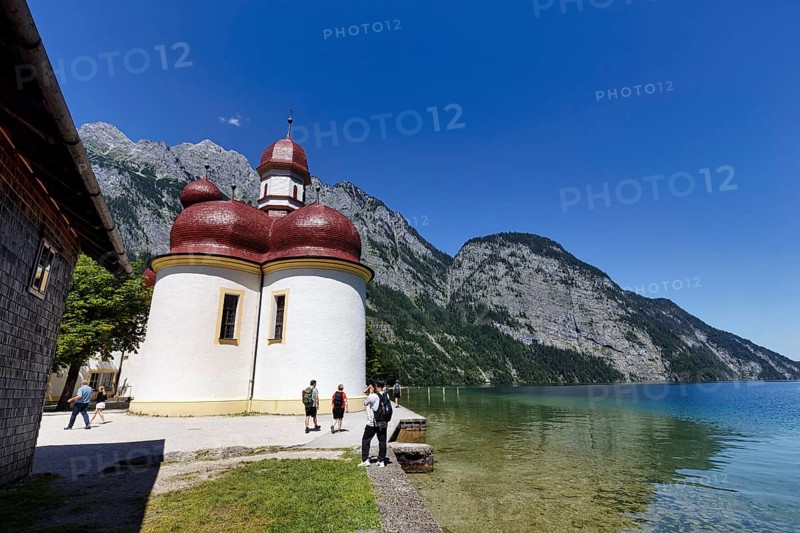 Pilgrimage church St. Bartholomä am Königssee with tourists, Berchtesgaden National Park, Berchtesgadener Land, Upper Bavaria, Bavaria, Germany, Europe