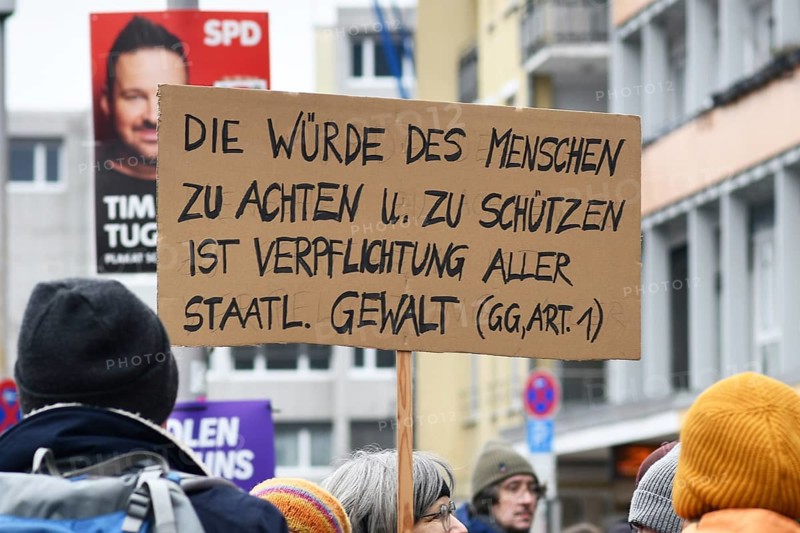 Heidelberg, Germany - February 12th 2025: Protest sign with text quoting the Basic Law for the Federal Republic of Germany at protest against far-right extremism