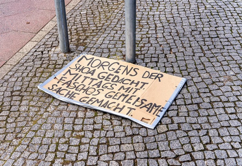 On the pavement, cardboard with election slogan after a demonstration, Berlin, Germany, Europe