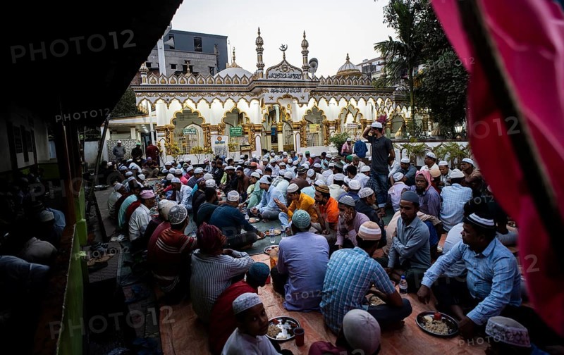 Muslims having Ramadan's Iftar at a amosque during Muslim holy month of Ramadan in Guwahati, India on March 5, 2025