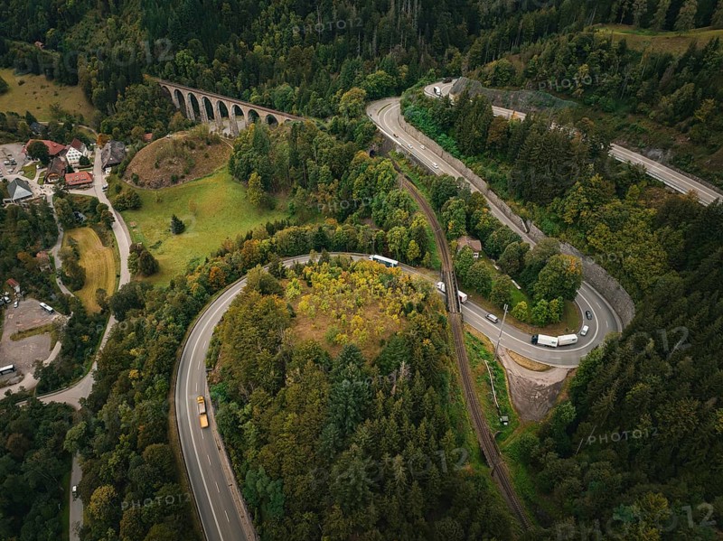 Winding road through forest and viaduct in hilly landscape, Ravenna Gorge, Black Forest, Germany, Europe