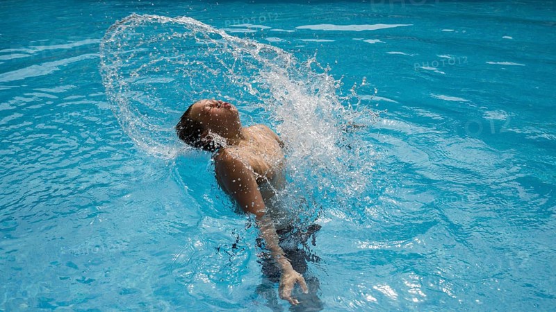 Thirteen-year-old boy, swimming pool