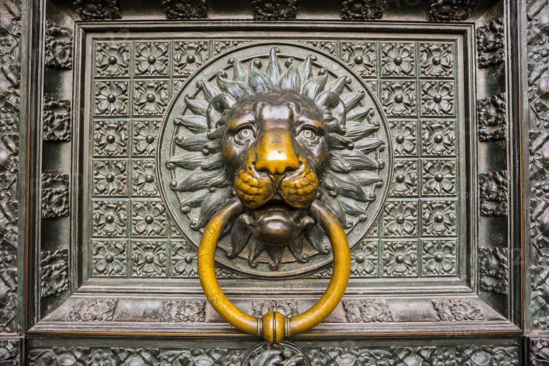 Lion's head, door knocker at the entrance portal, west façade, Cologne Cathedral, Cologne, North Rhine-Westphalia, Germany, Europe