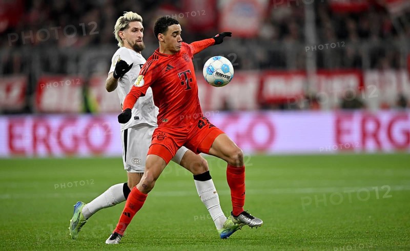 Jamal Musiala FC Bayern Munich FCB (42) against Robert Andrich Bayer 04 Leverkusen (08) DFB Cup round of 16, Allianz Arena, Munich, Bavaria, Germany, Europe