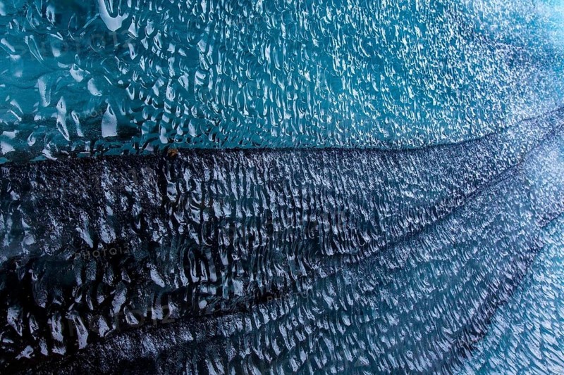Mýrdalsjökull glacier with layers of black volcanic ash, ice cap on the top of the active Katla volcano in the south of Iceland near Vík í Mýrdal