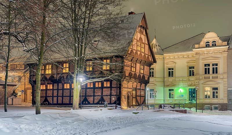 Amtspforte and Alte Polizei Winter snow illuminated Stadthagen Germany