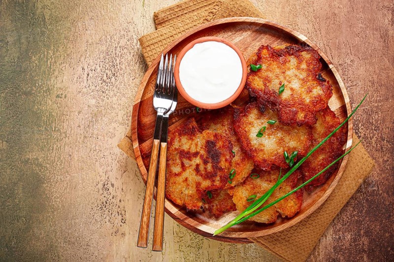 Potato pancakes, pancakes with sour cream, Belarusian dish, homemade, no people