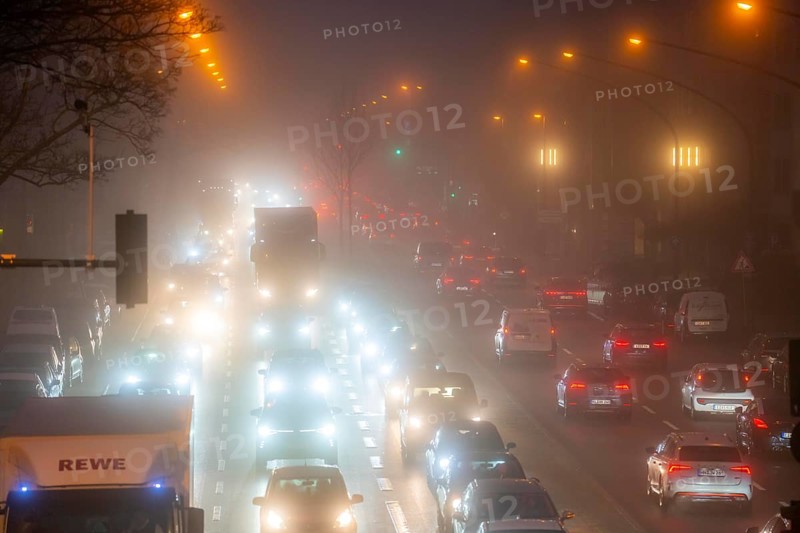 Dense fog, with visibility sometimes less than 100 metres, city centre traffic at rush hour on Alfredstraße, B224, in Essen, North Rhine-Westphalia, Germany, Europe