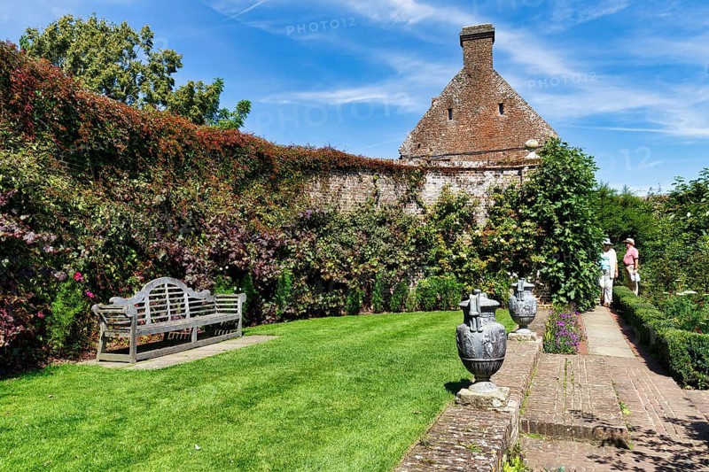 Gallery on a wall, bench, Sissinghurst Castle and Garden, Cranbrook, Kent, England, Great Britain