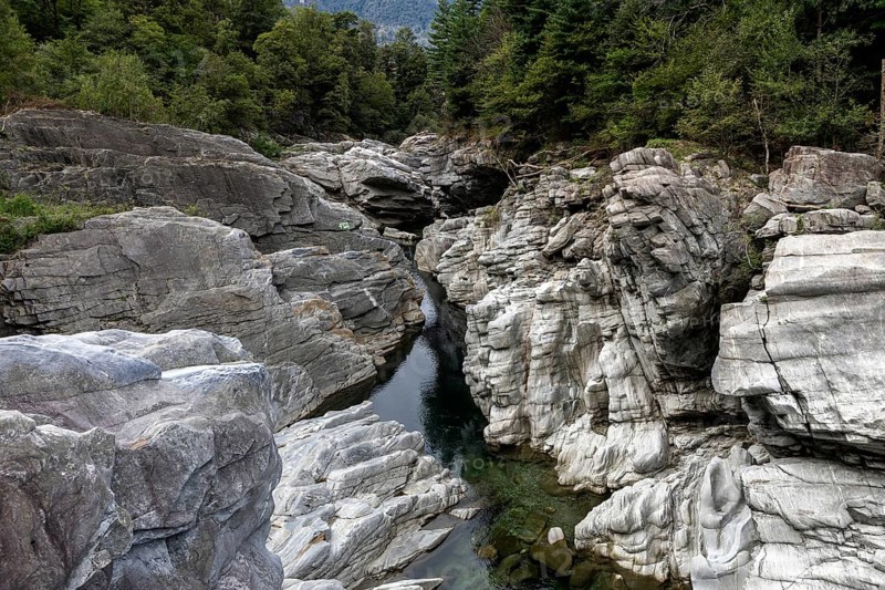 Rocks, granite rock formations in the Maggia River near Ponte Brolla, in the Maggia Valley, Valle Maggia, Canton Ticino, Switzerland, Europe