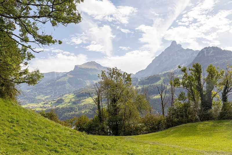 Small plateau at the Strahlegg castle ruins above Lake Walen, with the mountains to the south in the background, Weesen, St. Gallen, Switzerland, Europe