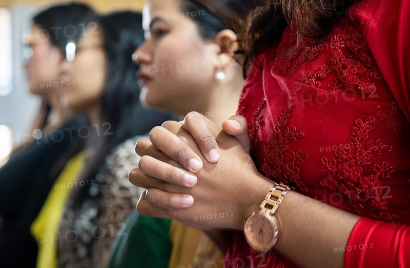 Devotees pray in church during a Christmas day sermon on December 25, 2024 in Guwahati, India. Christmas is a festive holiday celebrated on December 25th, marking the birth of Jesus Christ in Christian tradition.
