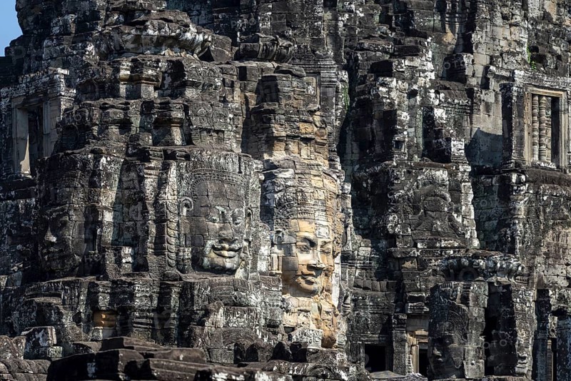 Giant stone-carved faces of the Bodhisattva Lokeshvara, also known as Avalokiteshvara, Bayon Temple, Angkor Thom, UNESCO World Heritage Site, Angkor Wat, Siem Reap, Cambodia, Asia