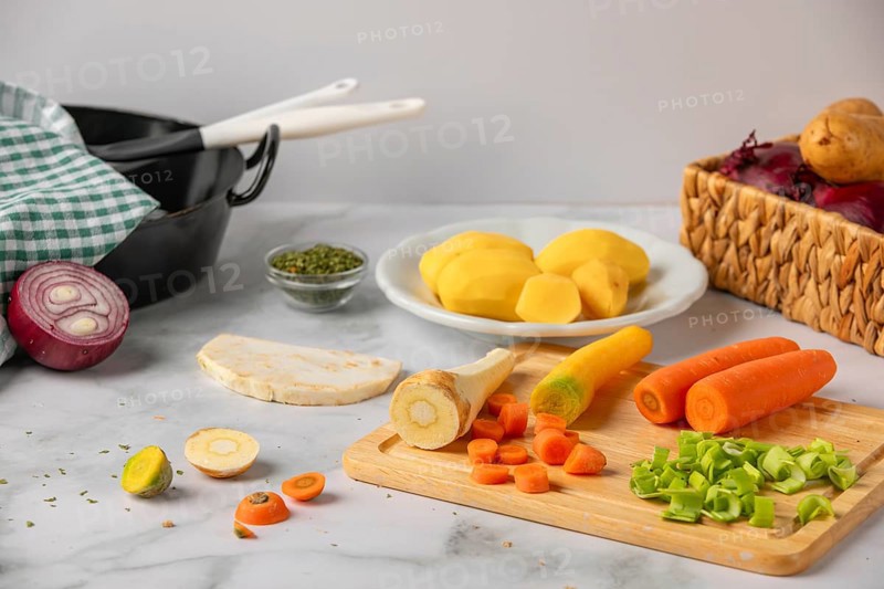 Peeled and chopped soup vegetables and potatoes, prepared for cooking