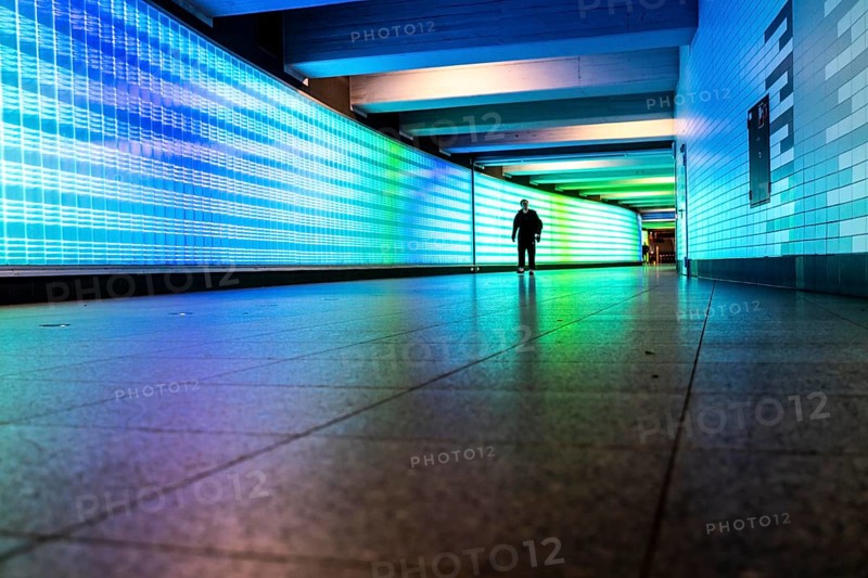 Passage under Essen's main railway station, connects entrances to the city and the main railway station, with the underground station, illuminated, LED wall, few people, Germany, Europe