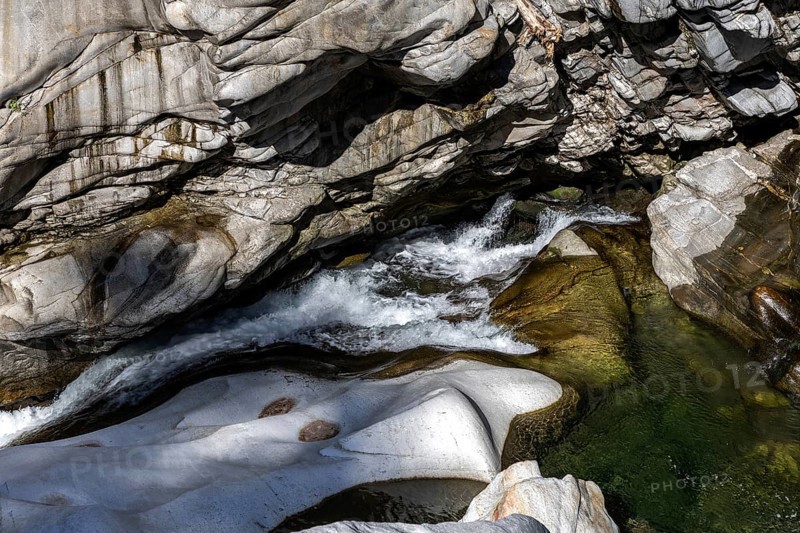 Rocks, granite rock formations in the Maggia River near Ponte Brolla, in the Maggia Valley, Valle Maggia, Canton Ticino, Switzerland, Europe