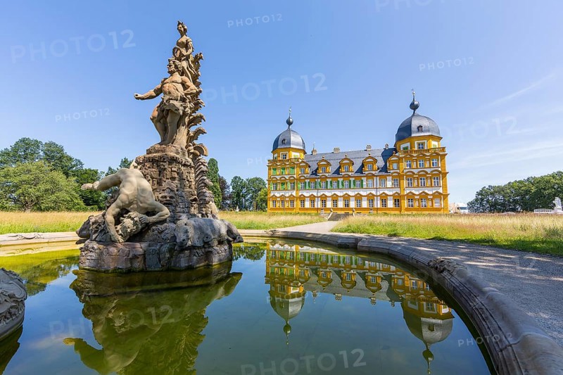 Park view of Seehof Castle with reflection in a water basin of the cascade, Hercules Group by Ferdinand Tietz, Memmelsdorf near Bamberg, Bavaria, Germany, Europe