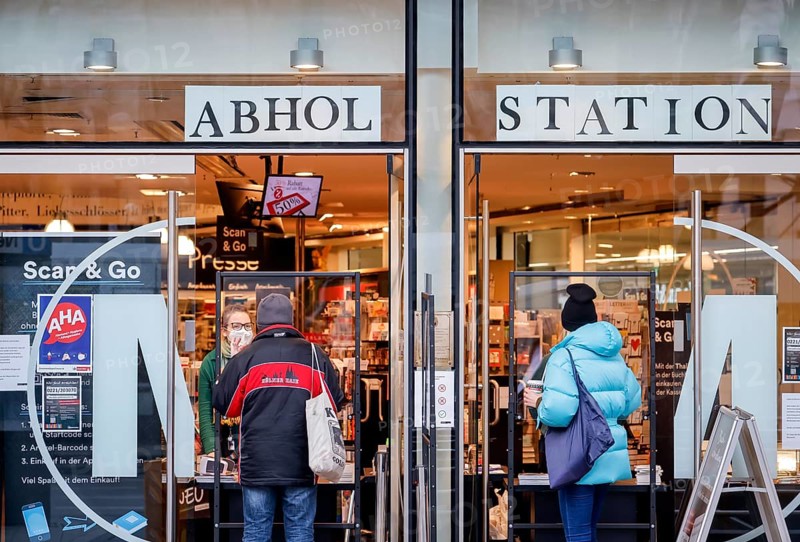 Cologne, North Rhine-Westphalia, Germany - Click and Collect in a bookshop, retail in times of the corona crisis during the second lockdown, the shops are closed, but some offer pick-up stations, customers can pick up goods ordered online