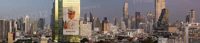 Panorama from the viewing platform of the Iconsiam on CAT Tower with huge billboard of the Thai King Maha Vajiralongkorn, skyscrapers, hotels and the banking district Bang Rak, skyline of Bangkok, Thailand, Asia