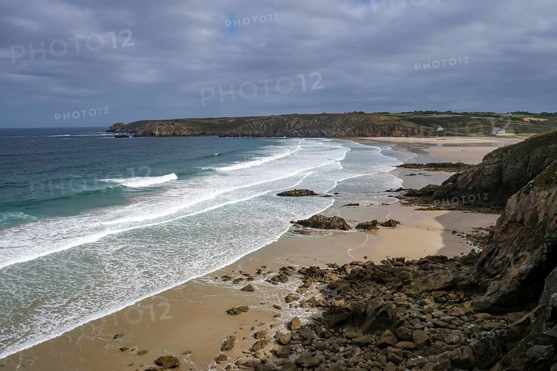 Plogoff, Brittany, France - Hiking trail from Pointe du Raz to Pointe du Van, here the bay with sandy beach Plage de la Baie des Trépassés, the coastal path Grande Randonnée 34, GR34 for short, also known as the publican's path, is a long-distance hiking route of around 2, 000 kilometres that leads once around Brittany