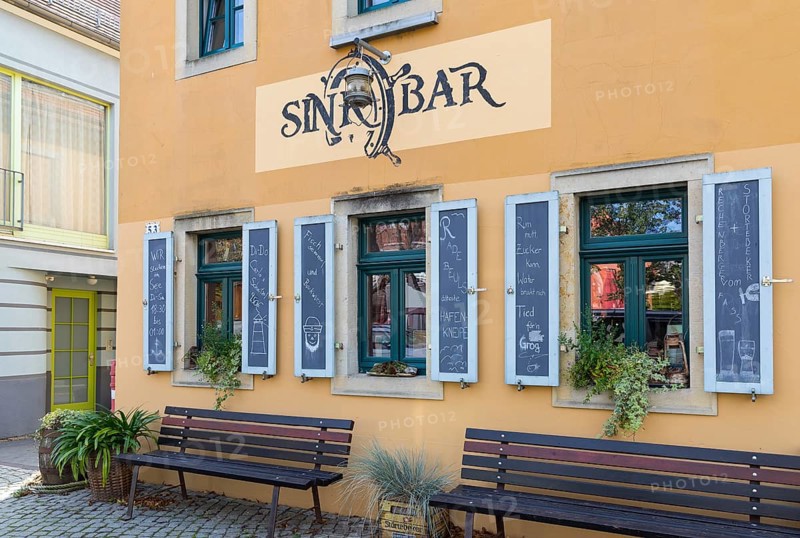 Exterior view of the Sinkbar pub with labelled shutters, village green of Altkötzschenbroda, Radebeul, Saxony, Germany, Europe