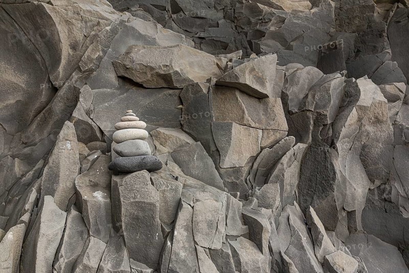 Reynisfjara Beach with Basalt rocks (Stuolabrrg) and the rock needles (Haidrangur), close to Vik i Myrdal, South Iceland