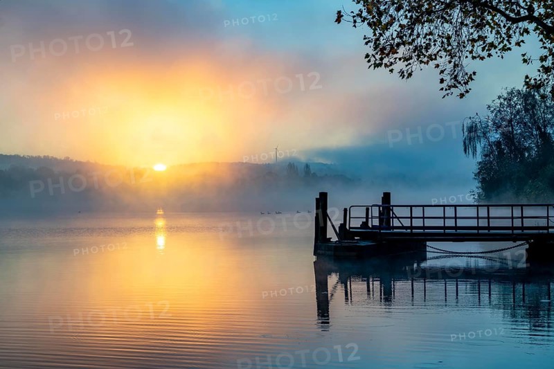 Sunrise, autumnal atmosphere at Lake Baldeney, landing stage for lake cruise boats of the White Fleet, near Haus Scheppen, in Essen, North Rhine-Westphalia, Germany, Europe