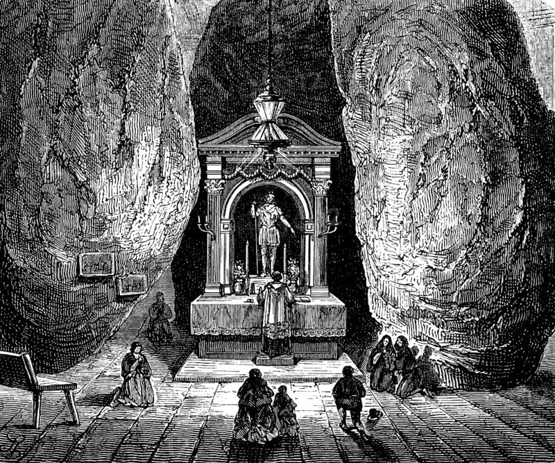 Dolmen of St Michael near Bilbao, province of Biscay, cave, rock chamber, altar, statue, light, people, archaeology, history of mankind, Spain, historical illustration 1880, Europe