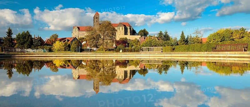 Castle hill with collegiate church of St. Servatius with reflection in water basin in autumn, UNESCO World Heritage Site, Quedlinburg, Saxony-Anhalt, Germany, Europe