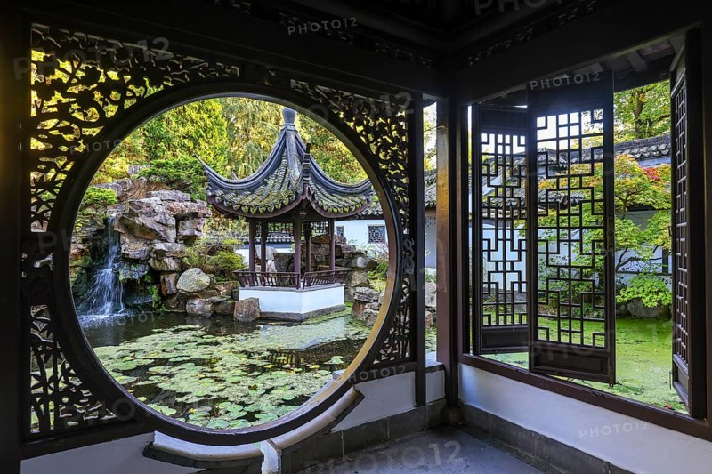 Bochum, North Rhine-Westphalia, Germany - Chinese Garden, Botanical Garden of the Ruhr University Bochum. The Chinese Garden Qian Yuan, built in 1990, is a classical South Chinese scholar's garden and a gift from the partner university, Tongji University in Shanghai. As part of the Ruhr University Bochum, the botanical garden is primarily used for research and teaching, but also for education and public recreation