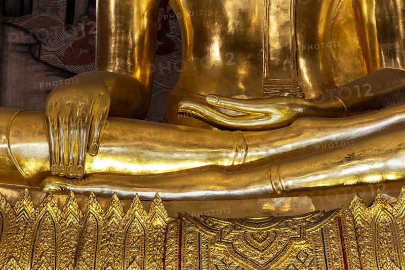 Golden Buddha statue, Phra Buddha Trilokachet, surrounded by exquisite murals, interior view of the Phra Ubosot or ordination hall, Wat Suthat Thepwararam, Royal Temple, Phra Nakhon, Bangkok, Thailand, Asia